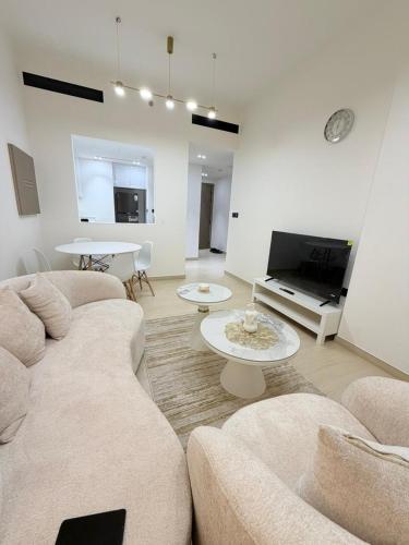Premium 1BR Apartment with City Views In JVC