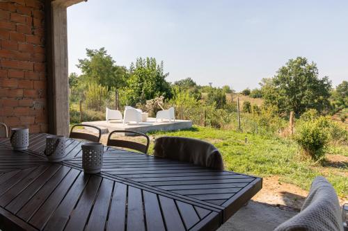 Dārzs, Casa all'angolo in Rocchetta Tanaro