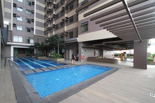 E&E Studio KingBed Cubao AranetaCity Pool Parking in Santolan