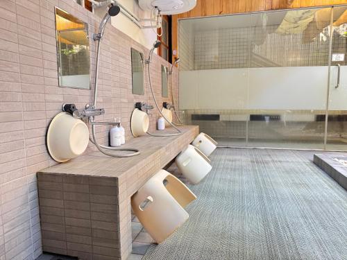 Hot spring bath, Nozawa Hostel and Onsen - Men Only near J&J Restaurant @ Samoeng