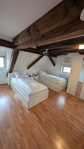 Twin room in a historic half-timbered house in Rottenburg, Deutschland