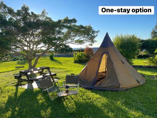 オーシャンビュービーチ迄徒歩8分広い庭のゆったりヴィラ電動自転車2台無料海と星とガジュマルブランコ