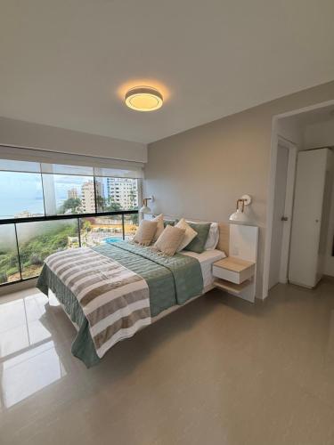 Cama, Oceanfront Playa Grande 10 min Airport Maiquetia Aeropuerto in Maiquetía
