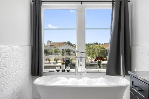 2 Million Villa Heated Pool w Luxury Spa 6BR & 6BR Waterfront by Canal in Apollo Beach