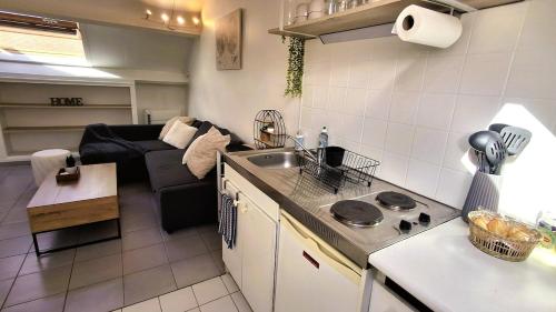 кухня, Joli Studio de 25 M2 proche de Disney in Клолюжьян