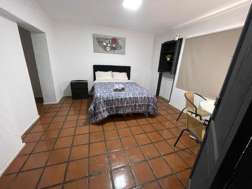 Habitación doble superior en el centro, con baño
