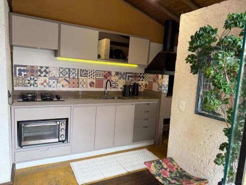 House with a view of the lagoon and nature to the beach in Rio Tavares