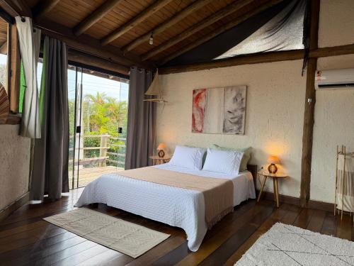 House with a view of the lagoon and nature to the beach in Rio Tavares