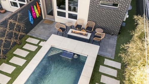 Luxury Oasis Heated Pool Rooftop Spa Fire Pits in Sloan's Lake