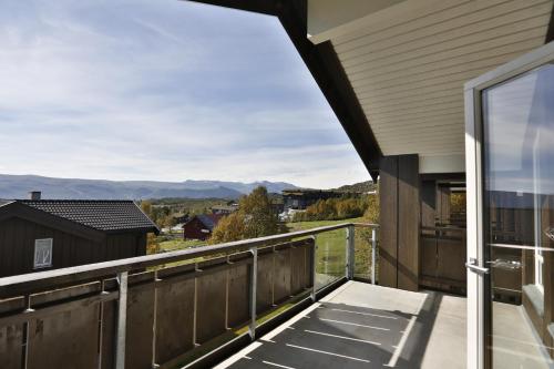 Balkong/terasse, Bright 2-Bedroom With Terrace And Fireplace in Beitostølen