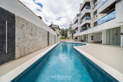 Aptos em prédio com piscina a 300 m da Praia dos Ingleses - ROHs, Florianópolis