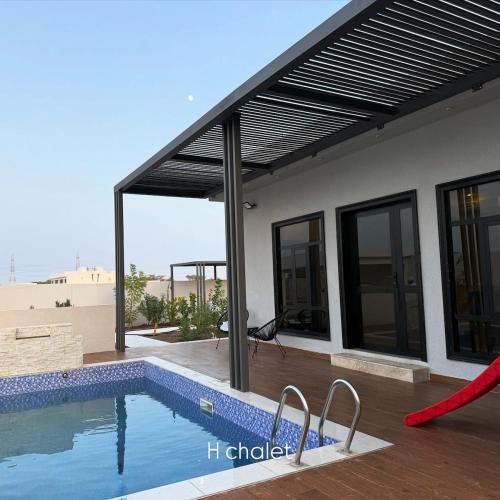 H chalet in Barka