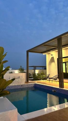 H chalet in Barka