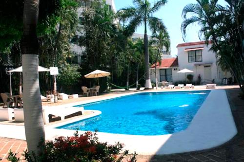 Hotel Olinala Diamante The 4-star Hotel Olinalá Diamante offers comfort and convenience whether youre on business or holiday in Acapulco. The hotel offers guests a range of services and amenities designed to provide comfo