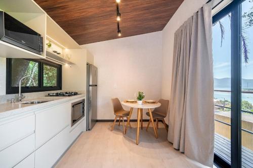 Studio Lacus com vista para a Lagoa by Achei in Mole Beach