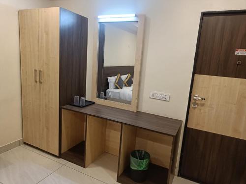 DVR GRAND-AC Rooms in Madhurawada