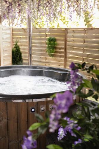 Kominkowy Chill - Jacuzzi, Sauny & Wybrane apartamenty z prywatnym jacuzzi