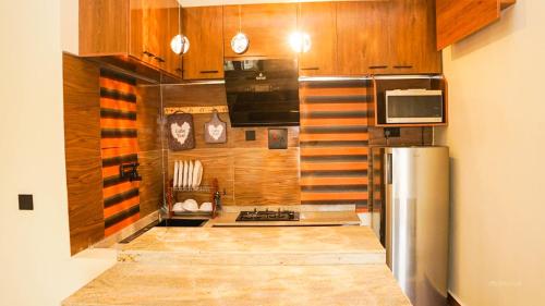 Cocina, One Bedroom Fully Furnished Serviced Apartment in Jos