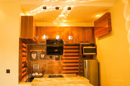 Cocina, One Bedroom Fully Furnished Serviced Apartment in Jos