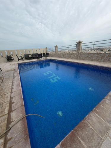 Swimming pool, Modern & Elegant Fully Equipped Apartment in Ar Ruq`ah