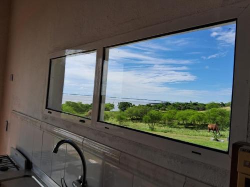 Manzara, La Buonaterra -Cabañas con playa privada sobre el Rio Uruguay (La Buonaterra -Cabanas con playa privada sobre el Rio Uruguay) in Fray Bentos