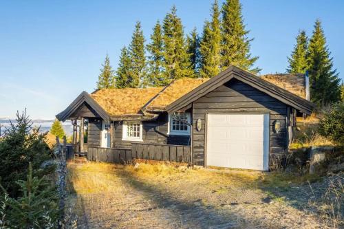 Buitenkant, Bekkeblom, family cabin with extension in Hafjell in Oyer