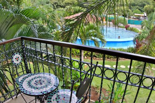 Balkons/terase, The Oaks Tamarindo Pool Front Condominiums fast wifi in La Garita Nueva