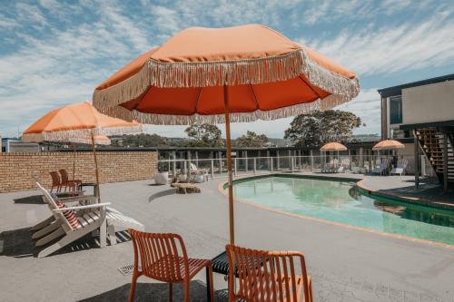 Swimming pool, The Black Dolphin Motel in Merimbula