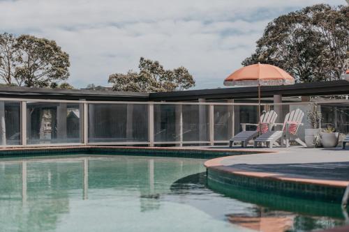 Swimming pool, The Black Dolphin Motel in Merimbula
