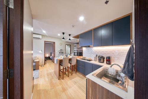 Kitchen, Sudirman Suites in Cimahi Selatan