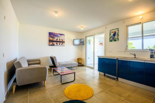Suite face à la plage et proche des commerces (Suite face a la plage et proche des commerces) in ลา ทรินิตี้
