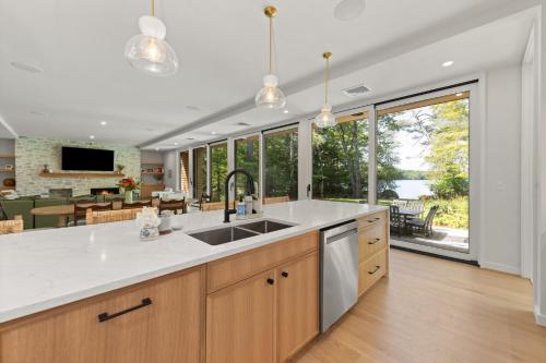 NEW! Tilted Pine - Lake Access Modern Home - image 13