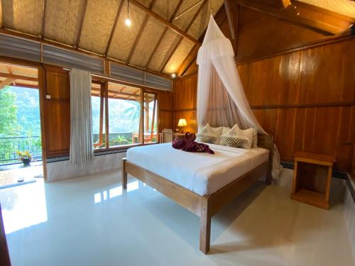 Buda's Homestay Lemukih Room Type - Double Room with Garden View Buda's Homestay Lemukih Room Type - Double Room with Garden View