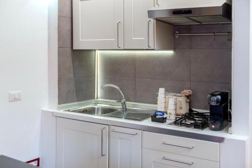 San Teodoro Apartment with Private Terrace - Tap to explore photos