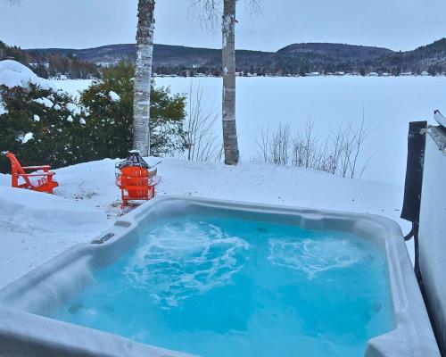 Waterfront with Spa and Lake Access in Saint-Damien (QC)