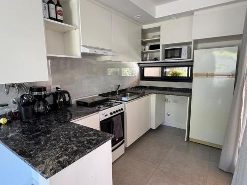 Casa con Pileta, Parrilla y Jardin en Rosario, Funes, Santa Fe in Funes