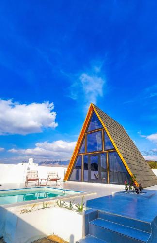 Wadi Bani Khalid-Al Joud Green hostel A-Frame Cabin – khách sạn tại Al Wasil