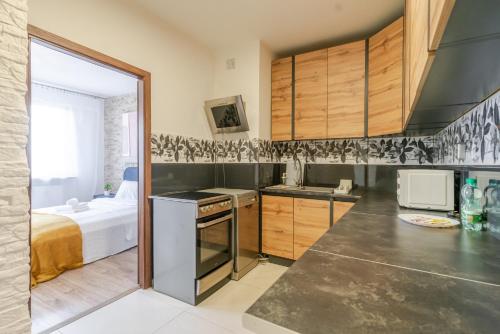 廚房, 11 listopada Comfort Apartment by BookingHost in 達布羅卡馬拉