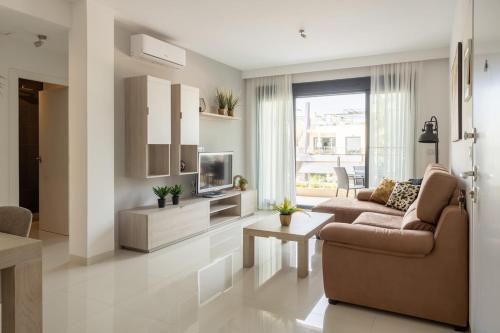 Stylish penthouse with roof terrace for 4 guests – khách sạn tại Dehesa de Campoamor