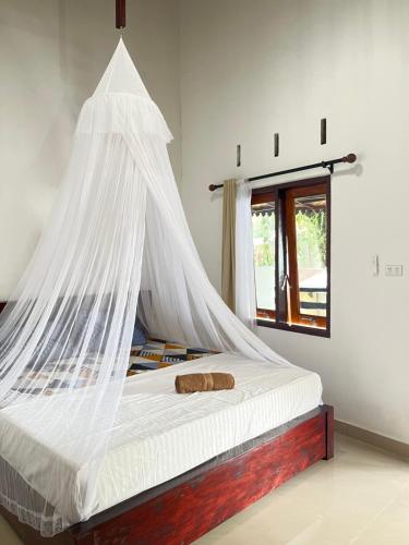 Bed, Thousands of Bottles - Hostel and Trekking Agency Sumatra Orangutan Nature in Bukit Lawang