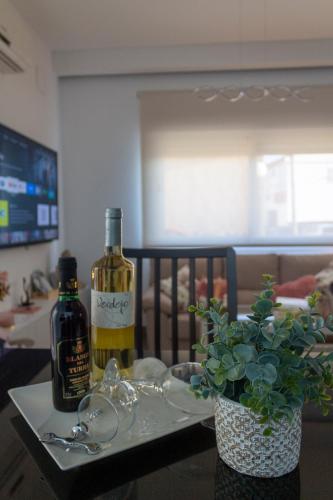 Koplietošanas atpūtas telpa ar TV, Tres Torres Apartamento Turístico (Tres Torres Apartamento Turistico) in Almoharin