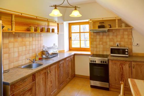 virtuve, Apartament w Muzeum Michała Kajki (Apartament w Muzeum Michala Kajki) in Ogródek
