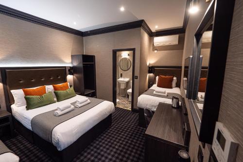 Habitación triple, deluxe