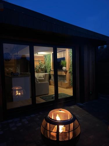 White River Retreats luxury lodges with Private Wood Fired Hot Tubs in Chwilog