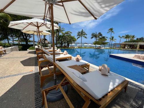 Luxury Ocean view Condo with Golf Cart in Villela