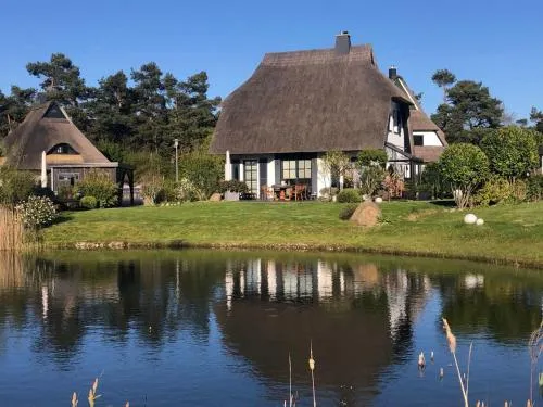 Holiday Home Reetdachhaus am Wasser mit Sauna- Außenwhirlpool- Kamin und E-Ladestation by Interhome in Fuhlendorf, Deutschland