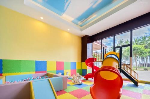 Laste klubi, Aijing International Hotel in Wenchang