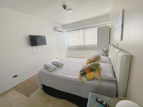 4-5 personas apartamento frente al mar porlamar cerca del cc la vela – khách sạn tại Porlamar