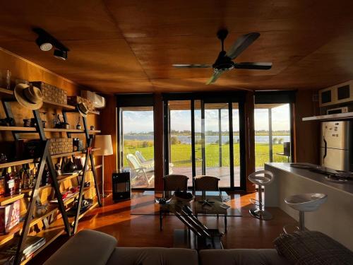 Eco house in a gated neighborhood with a lagoon and dock in San Andres de Giles