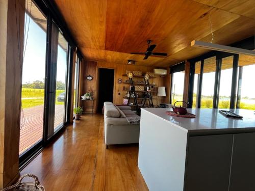 Eco house in a gated neighborhood with a lagoon and dock in San Andres de Giles